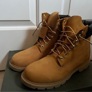Men’s 8.5 Timberland boots, classic tan color